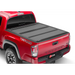 Red truck bed cover with matte finish for Toyota Tacoma - BAKFlip MX4.