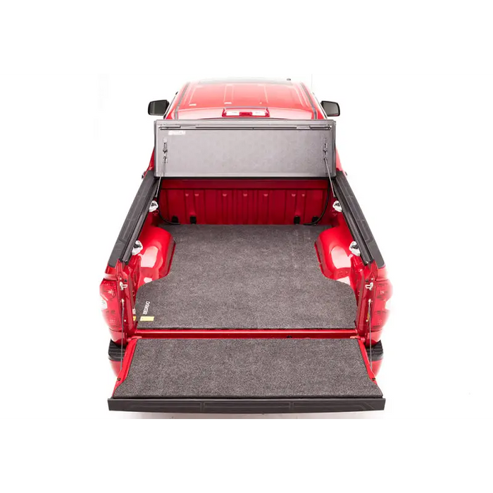 Red pickup truck with bed open - BAK 16-20 Toyota Tacoma 6ft Bed BAKFlip G2