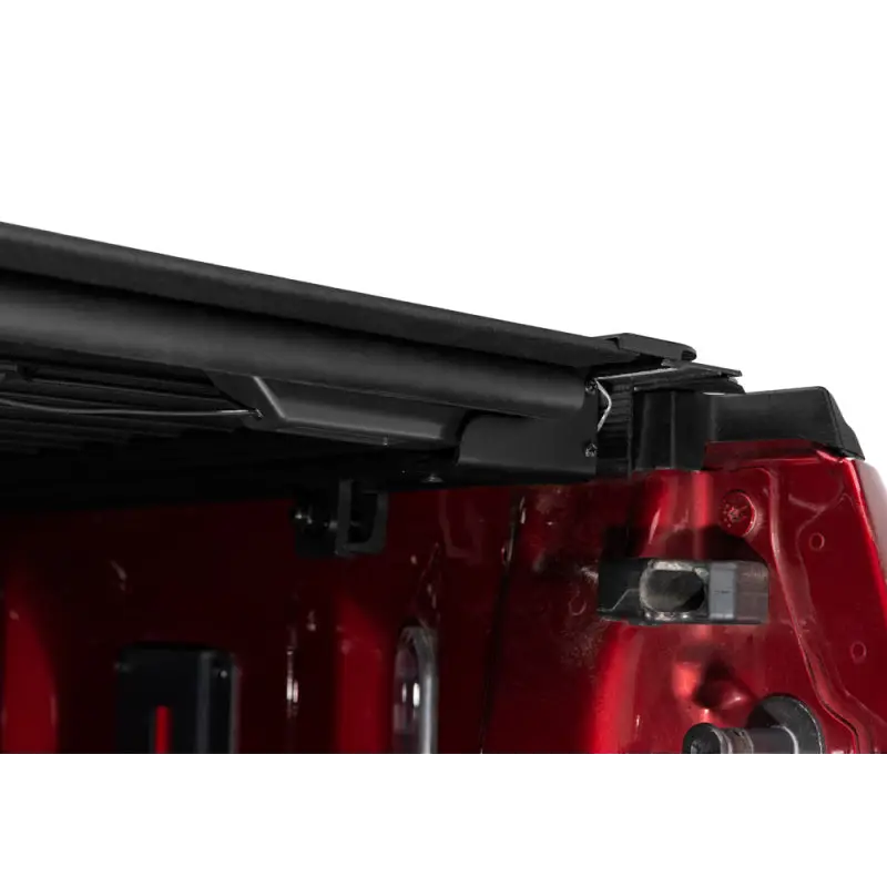 Red Jeep with Roof Rack mounted on BAK Revolver X4s Bed Cover.
