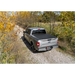 Toyota Tacoma Revolver X4s truck bed cover parked on dirt road