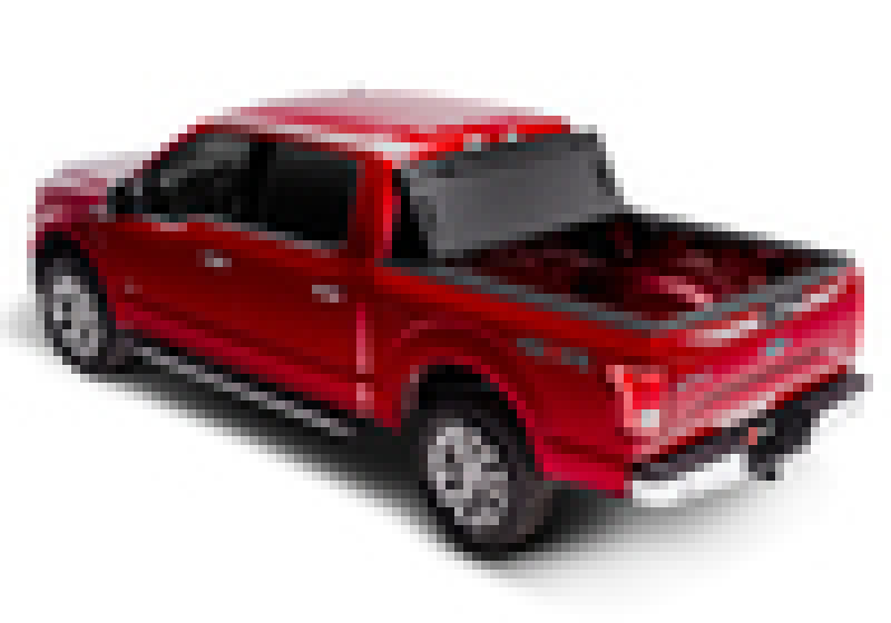 Red toy truck with black top on bak 17-23 ford super duty 6ft 9in bed bakflip fibermax