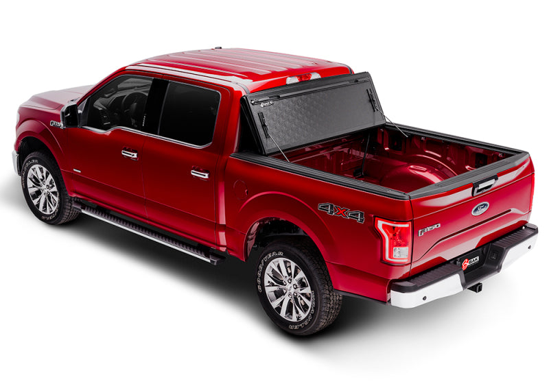 Red truck with black bed cover - bak 17-23 ford super duty 6ft 9in bed bakflip g2