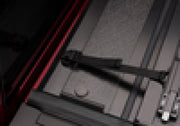Black and red ford super duty truck bed cover with red door - bak 17-23 bakflip g2