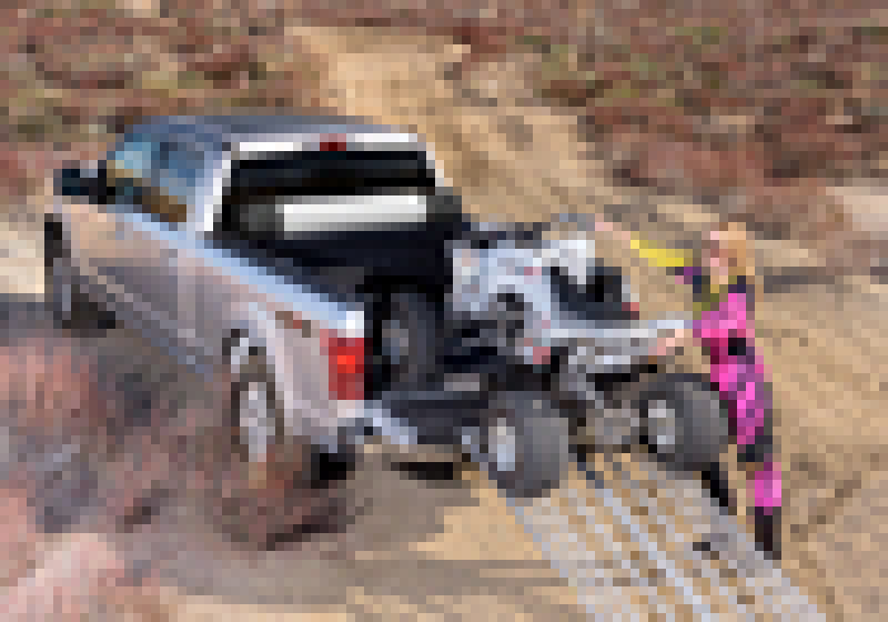 Truck bed cover on a dirt road