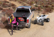 Ford super duty truck bed with bak revolver x2 installed on dirt road