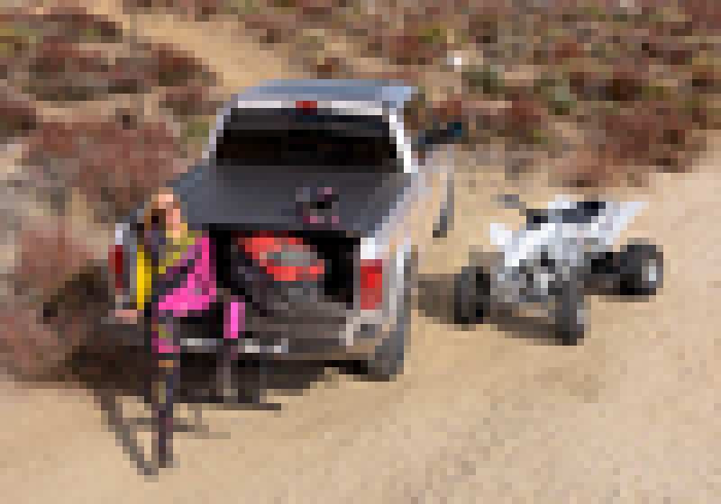 Ford super duty truck bed with bak revolver x2 installed on dirt road