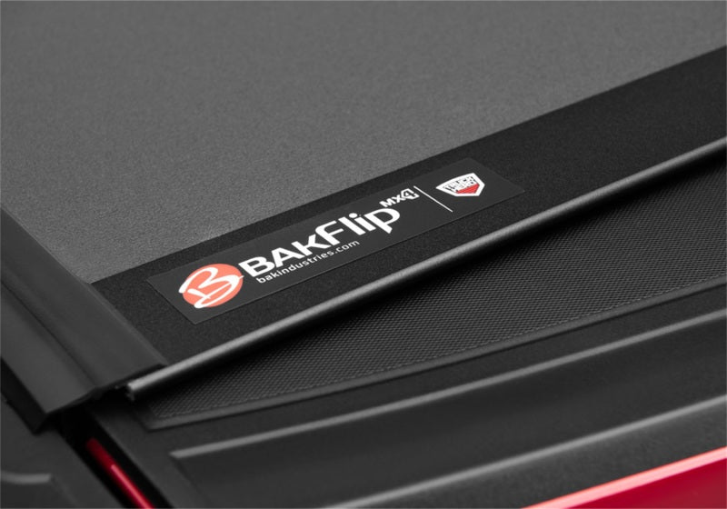 Black and red folder with label on bak 19-20 chevy silverado 1500 6ft 6in bed bakflip mx4