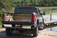 Chevy silverado truck parked on a dock next to water - bakflip fibermax installation instructions