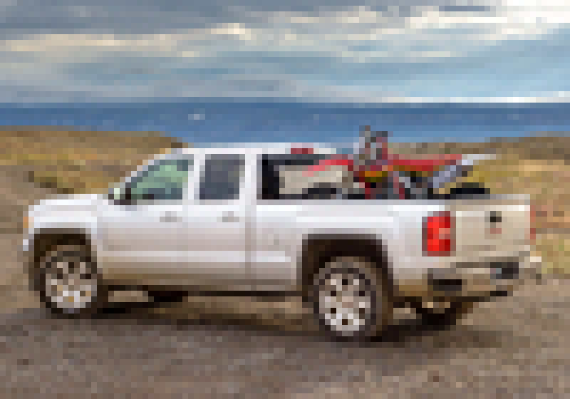 White truck with red and black roof rack - bak 19-20 chevy silverado 5ft 8in bed bakflip f1