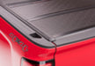 Red and black bakflip f1 tonneau cover on chevy silverado truck