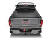 Rear view of grey car on bak 19-20 chevy silverado 5ft 8in bed bakflip f1
