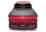 Red chevy silverado 5ft 8in bed with bed cover open