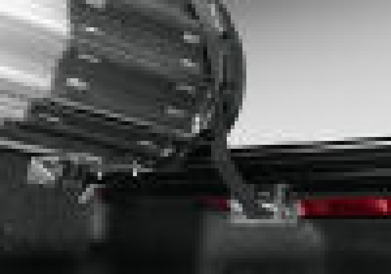 Black and white photo of a chevy silverado 5ft 8in bed revolver x2 car