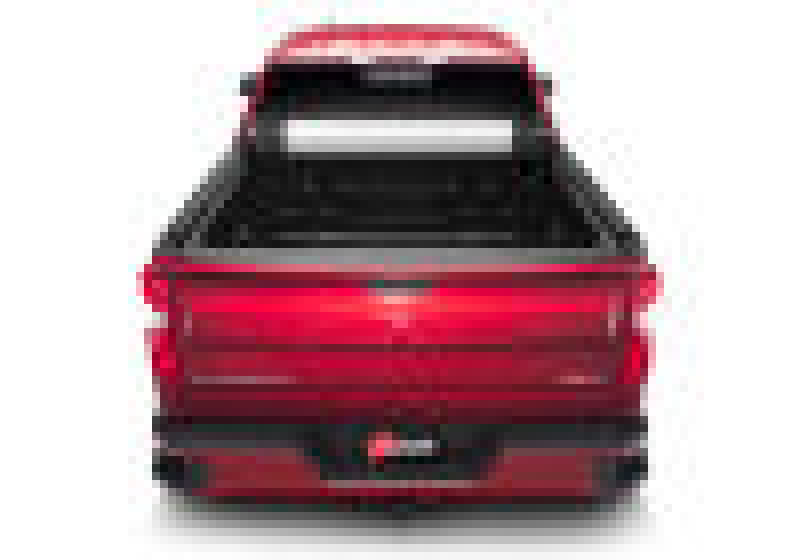 Red chevy silverado 5ft 8in bed revolver x2 with hood open