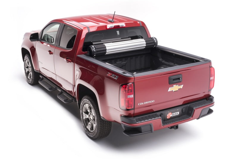 Red truck with black bed cover for bak 19-20 chevy silverado 5ft 8in bed revolver x2