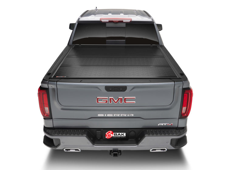 Bakflip g2 truck bed cover on a gray gmc truck