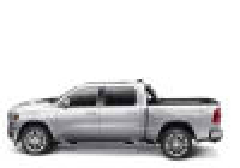 White truck with black roof on bakflip mx4 for ram 1500 with installation instructions