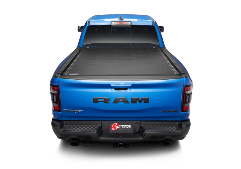 Blue truck with tail fin, bak 19-20 dodge ram 1500 5ft 7in bed revolver