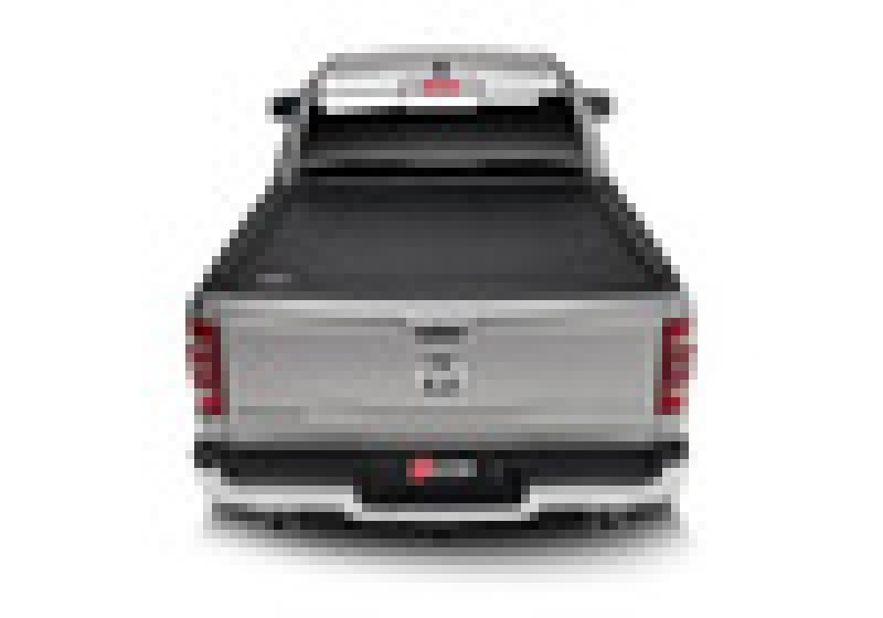 Silver car rear view on 5ft 7in truck bed revolver