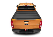 Yellow truck rear view with bak 19-20 ford ranger 5ft bed bakflip mx4 matte finish