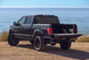 Black truck driving on dirt road - bak 19-20 ford ranger 5ft bed bakflip mx4