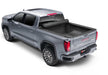 Gray 2019 chevrolet titan truck with a bak bed cover