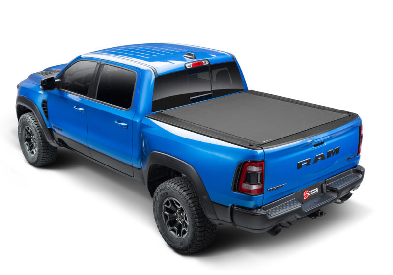 Blue truck with black bed cover - bak ram box revolver x4s 5.7ft bed cover for 19-21 dodge ram 1500