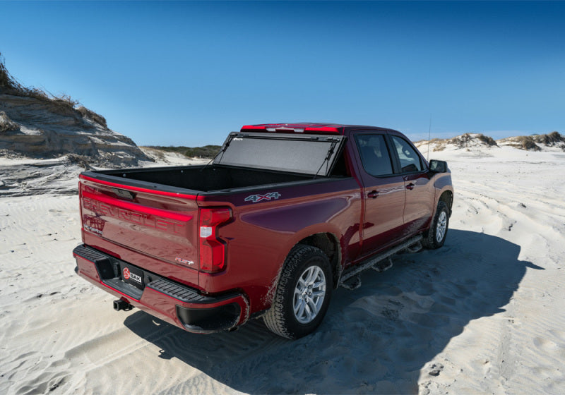 Toyota tundra parked on sandy beach, compatible with bak 19-21 gm sierra 1500 (carbon pro bed) 5ft 8in bed