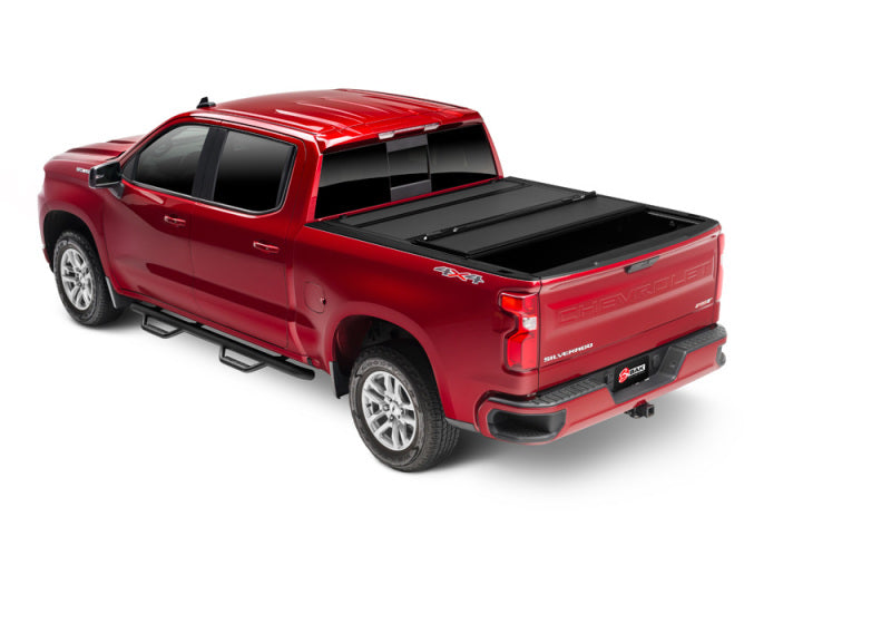 Red truck with black bed cover on bakflip mx4 for 19-21 gm sierra 1500 (carbon pro bed)