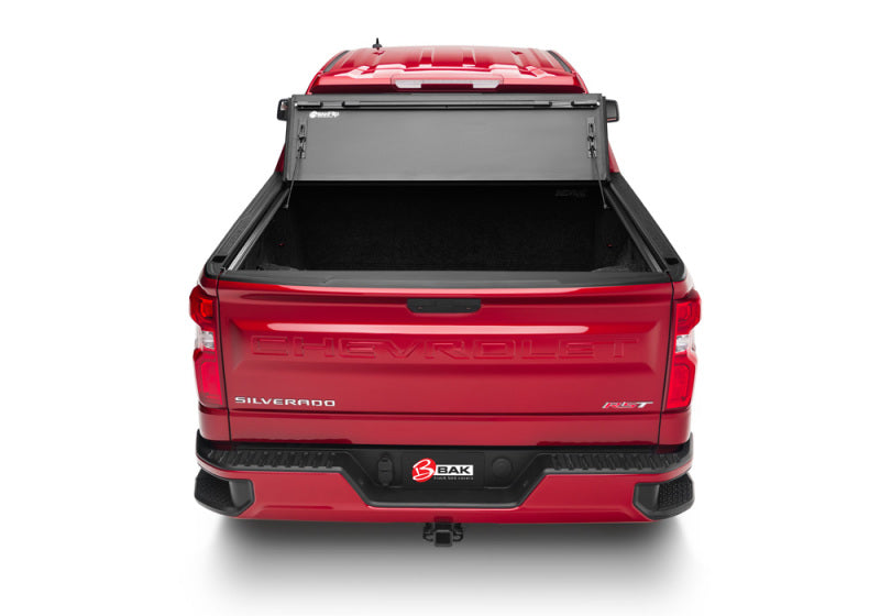 Red truck with open trunk box on bakflip mx4 for 19-21 gm sierra 1500 (carbon pro bed)