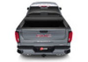 Grey car rear view with bak revolver x4s bed cover