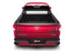 Red truck with open hood in bak 2020 chevy silverado 2500/3500 hd 6ft 9in bed revolver x2