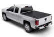 White pickup truck with black 6ft 9in bed displayed in bak revolver x2 product for chevy silverado 2500/3500 hd