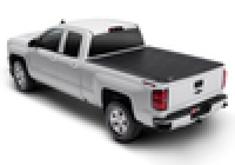 White pickup truck with black 6ft 9in bed displayed in bak revolver x2 product for chevy silverado 2500/3500 hd