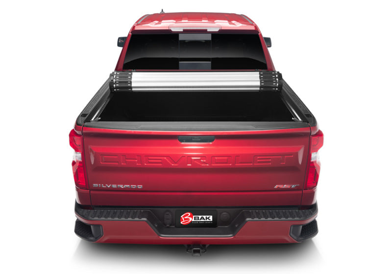 Red truck with open bed cover, bak 2020 chevy silverado 2500/3500 hd 6ft 9in bed revolver x2