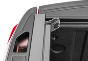 2020 chevy silverado 2500/3500 hd truck bed with open door and person in back seat