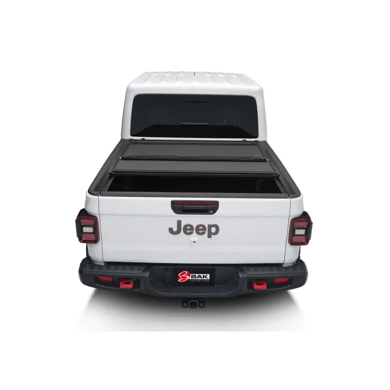 White truck with open bed cover on BAK 2020 Jeep Gladiator 5ft Bed BAKFlip MX4