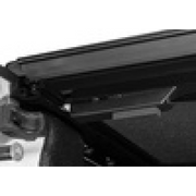 Black and white cat sitting on white background, BAK 2020 Jeep Gladiator 5ft Bed BAKFlip MX4.