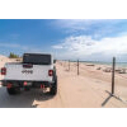 Truck parked on beach - BAK 2020 Jeep Gladiator Bed Cover