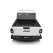 White Volkswagen SUV on BAK 2020 Jeep Gladiator 5ft Bed BAKFlip MX4