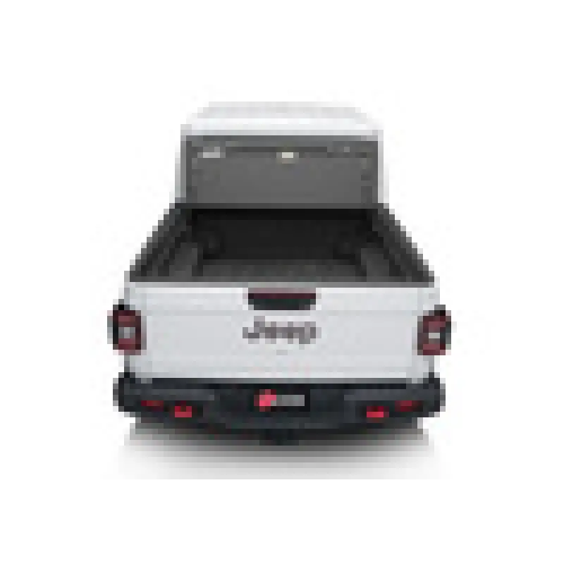 White Volkswagen SUV on BAK 2020 Jeep Gladiator 5ft Bed BAKFlip MX4