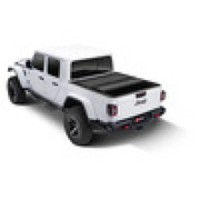 White and black BAK 2020 Jeep Gladiator 5ft Bed BAKFlip MX4 truck.