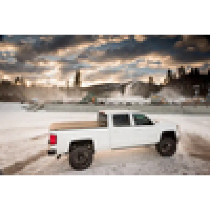 White truck parked in snow - BAK 2020 Jeep Gladiator Revolver X2.