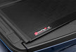 Black luggage case on the side of a ford f-150 truck bed cover