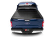 Blue truck bed cover with tail light on - bak 2021+ ford f-150 regular super cab & super crew (4 door) bakflip g