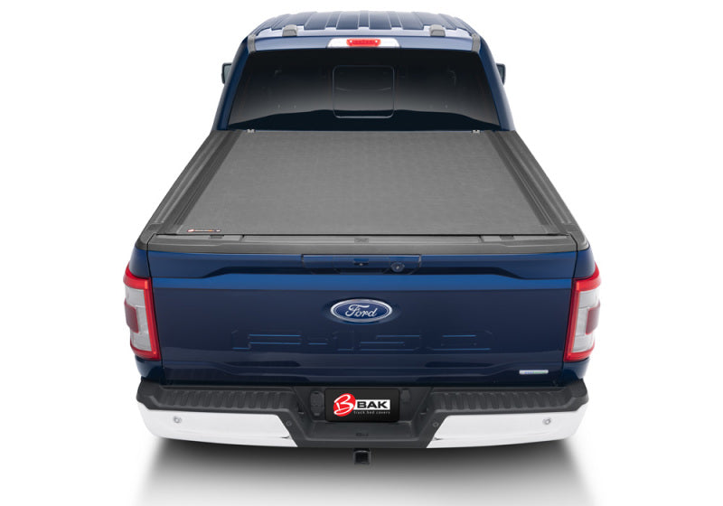 Blue 2020 ford f-150 truck with bak revolver x4s 6.5ft bed cover