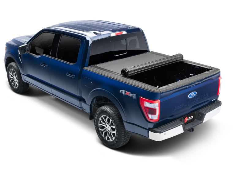 Blue truck with ton bed - bak 2021+ ford f-150 revolver x4s 6.5ft bed cover