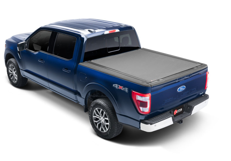 Blue truck bed cover for 2021+ ford f-150 with bak revolver x4s design