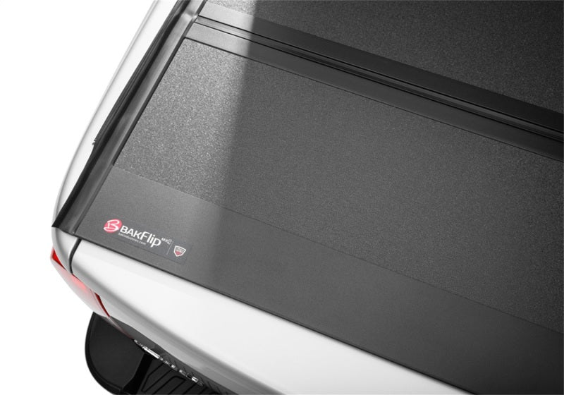 2022 nissan frontier with folded back seat-locking tonneau cover installation instructions