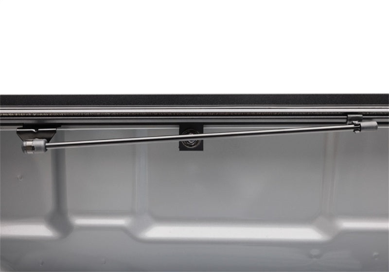 Black and white car door handle on bak 2022 nissan frontier 5ft bed bakflip mx4 matte finish